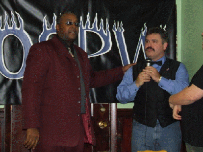 PRESENTERS OSPW WRESTLER OF THE YEAR JAZZ MILES AND THE BRUISER